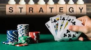 Image showing text that says Poker Strategy. The debate is to raise or not to raise.